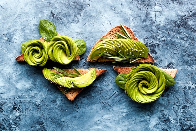 Avocados beautifully sliced on toast.