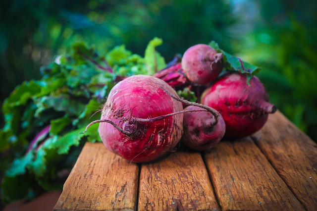 fresh beets on a table. 